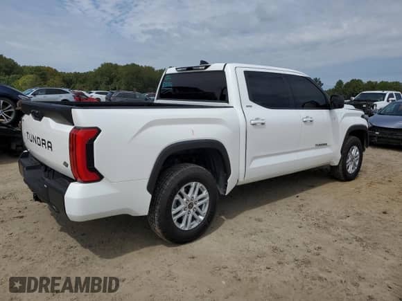 2022 Toyota Tundra SR5 with VIN 5TFLA5DB9NX044046, listed as a Copart auction lot 68077643 with 21,502 mi miles and . Bid and sale history available at DreamBid. Image 3.