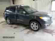 2010 Hyundai Santa Fe Limited with VIN 5NMSK4AG8AH374248, listed as a Copart auction lot 58821985 with 216,307 mi miles and Salvage title. Bid and sale history available at DreamBid. Image 4.