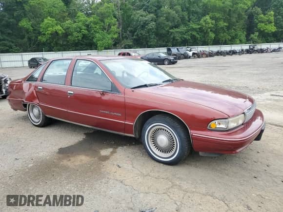 1992 Chevrolet Caprice z VIN 1G1BN53EXNR152894, wystawiony jako Copart lot #57489535 z przebiegiem 167 778 mil mil oraz Szkoda całkowita • Salvage title. Historia ofert i sprzedaży dostępna na DreamBid. Obrazek 4.