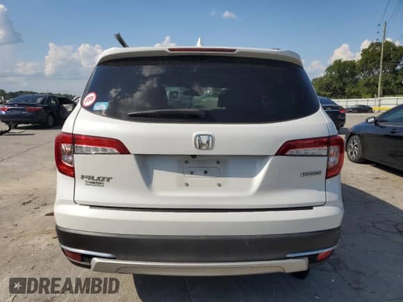 2021 Honda Pilot Touring 8-Passenger z VIN 5FNYF5H96MB011738, wystawiony jako Copart lot #68089255 z przebiegiem 126 655 mil mil oraz Szkoda całkowita • Salvage title. Historia ofert i sprzedaży dostępna na DreamBid. Obrazek 6.