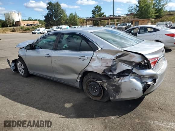 2015 Toyota Camry LE z VIN 4T1BF1FK3FU490078, wystawiony jako Copart lot #82317675 z przebiegiem 203 535 mil mil oraz Szkoda całkowita • Salvage title. Historia ofert i sprzedaży dostępna na DreamBid. Obrazek 2.