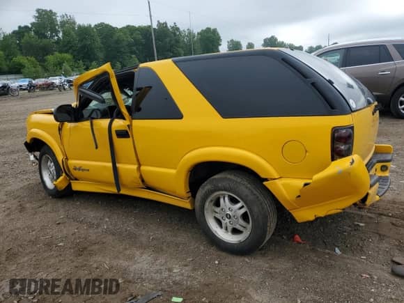 2003 Chevrolet Blazer LS z VIN 1GNCS18X43K116185, wystawiony jako Copart lot #56846644 z przebiegiem Nie podano mil oraz Czysty tytuł • Clean title. Historia ofert i sprzedaży dostępna na DreamBid. Obrazek 2.