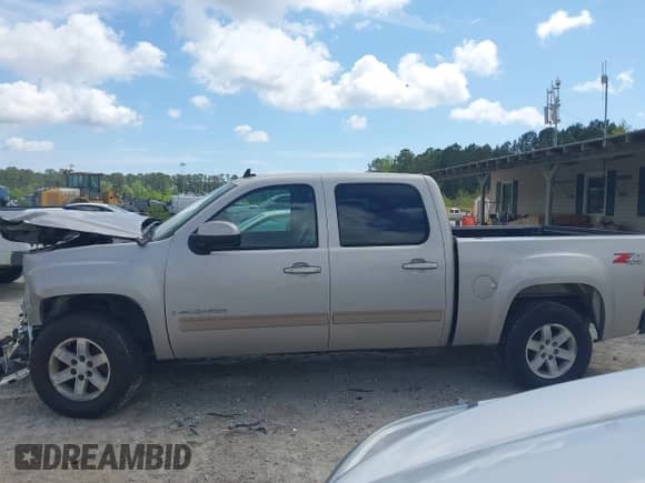 2007 GMC Sierra 1500 SLE1 z VIN 2GTEK13M471645415, wystawiony jako IAAI lot #41964550 z przebiegiem 170 796 mil mil oraz . Historia ofert i sprzedaży dostępna na DreamBid. Obrazek 14.