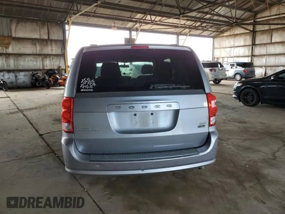 2014 Dodge Grand Caravan SXT with VIN 2C4RDGCG4ER184109, listed as a Copart auction lot 81249405 with 87,245 mi miles and Clean title. Bid and sale history available at DreamBid. Image 6.