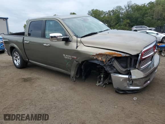 2014 Ram 1500 Laramie with VIN 1C6RR7NT3ES453198, listed as a Copart auction lot 80993835 with 79,321 mi miles and Salvage title. Bid and sale history available at DreamBid. Image 4.