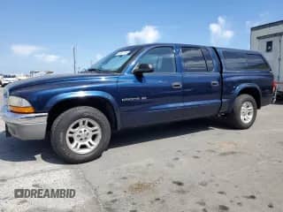 2001 Dodge Dakota Sport with VIN 1B7HL2AX31S278317, listed as a Copart auction lot 55467745 with 86,799 mi miles and Clean title. Bid and sale history available at DreamBid. Image 1.