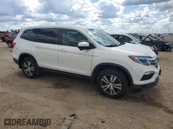 2017 Honda Pilot EX with VIN 5FNYF6H32HB058093, listed as a Copart auction lot 70226885 with 207,003 mi miles and Salvage title. Bid and sale history available at DreamBid. Image 4.