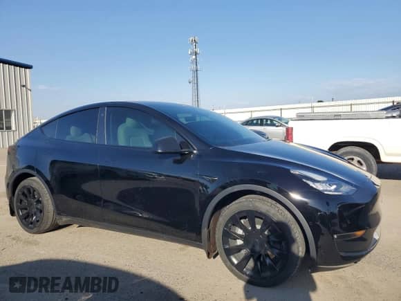 2022 Tesla Model Y Long Range с VIN 7SAYGAEE2NF417561, выставлен на аукционе Copart как лот 84251505 с пробегом 30 145 миль миль и Списание • Salvage title. История ставок и продаж доступна на DreamBid. Изображение 4.