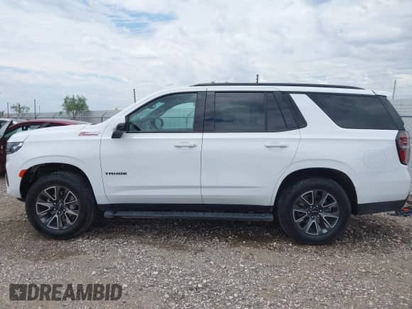 2023 Chevrolet Tahoe Z71 with VIN 1GNSKPKD2PR378068, listed as a IAAI auction lot 42880822 with 50,840 mi miles and . Bid and sale history available at DreamBid. Image 16.