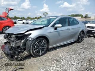 2019 Toyota Camry XSE z VIN 4T1B61HK3KU840977, wystawiony jako Copart lot #71608315 z przebiegiem 124 557 mil mil oraz Szkoda całkowita • Salvage title. Historia ofert i sprzedaży dostępna na DreamBid. Obrazek 1.