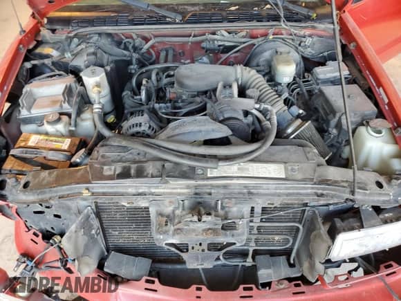 2001 Chevrolet Blazer LS with VIN 1GNCS18W21K251301, listed as a Copart auction lot 88428965 with 166,415 mi miles and Salvage title. Bid and sale history available at DreamBid. Image 12.