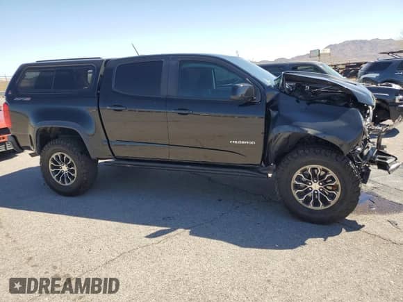 2020 Chevrolet Colorado 4WD ZR2 с VIN 1GCGTEEN4L1182310, выставлен на аукционе Copart как лот 72256164 с пробегом 56 937 миль миль и Списание • Salvage title. История ставок и продаж доступна на DreamBid. Изображение 4.