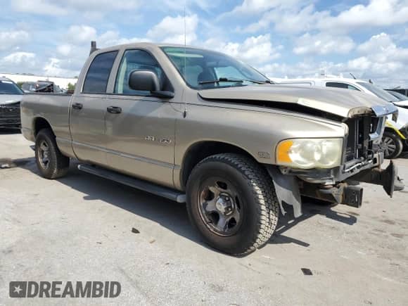 2003 Dodge 1500 ST with VIN 1D7HA18D73S271701, listed as a Copart auction lot 66928405 with 184,859 mi miles and Salvage title. Bid and sale history available at DreamBid. Image 4.