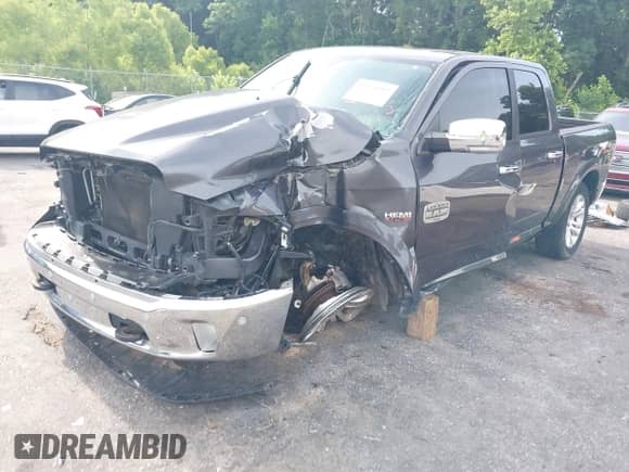 2014 Ram 1500 Longhorn z VIN 1C6RR6PT9ES339732, wystawiony jako IAAI lot #42325192 z przebiegiem Nie podano mil oraz . Historia ofert i sprzedaży dostępna na DreamBid. Obrazek 17.