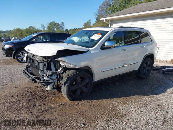2012 Jeep Grand Cherokee Limited z VIN 1C4RJFBGXCC342513, wystawiony jako IAAI lot #43416360 z przebiegiem 173 799 mil mil oraz . Historia ofert i sprzedaży dostępna na DreamBid. Obrazek 21.
