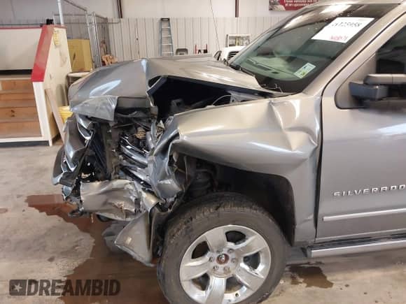 2017 Chevrolet Silverado 1500 LTZ z VIN 3GCUKSEJ4HG328926, wystawiony jako IAAI lot #41125958 z przebiegiem 248 071 mil mil oraz . Historia ofert i sprzedaży dostępna na DreamBid. Obrazek 21.
