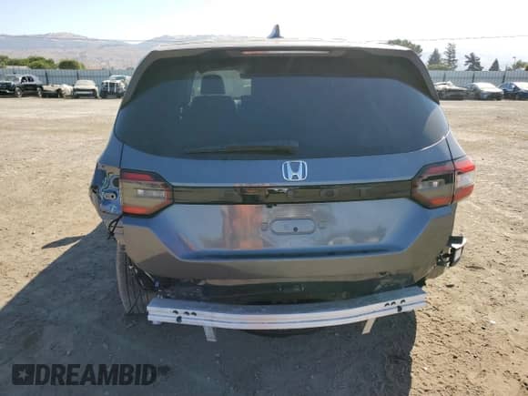 2024 Honda Pilot EX-L с VIN 5FNYG2H5XRB005618, выставлен на аукционе Copart как лот 66696155 с пробегом 17 503 миль миль и Списание • Salvage title. История ставок и продаж доступна на DreamBid. Изображение 6.