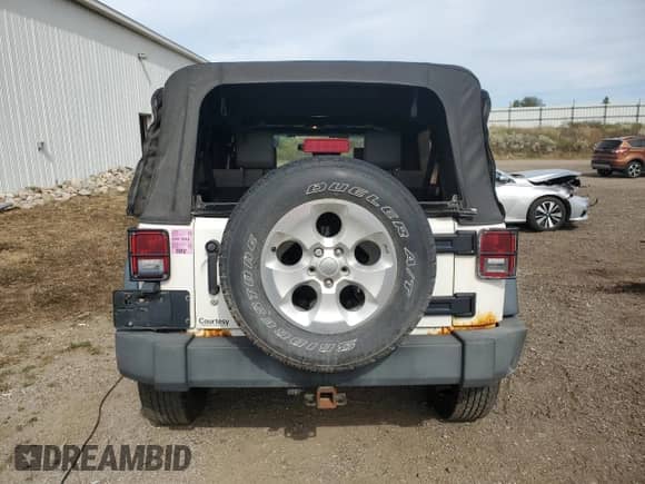 2008 Jeep Wrangler Unlimited X with VIN 1J8GA39158L654942, listed as a Copart auction lot 81987735 with 176,984 mi miles and Clean title. Bid and sale history available at DreamBid. Image 6.
