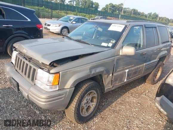 1998 Jeep Grand Cherokee Limited с VIN 1J4GZ78Y7WC247346, выставлен на аукционе IAAI как лот 42873984 с пробегом 129 259 миль миль и . История ставок и продаж доступна на DreamBid. Изображение 2.