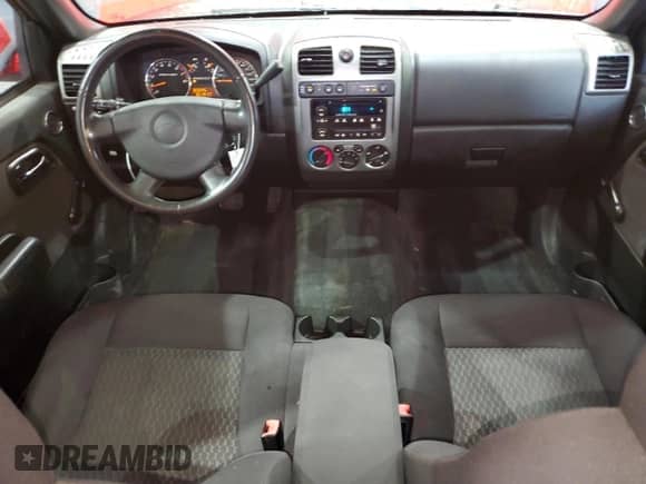2012 Chevrolet Colorado Work Truck z VIN 1GCJTBF99C8121080, wystawiony jako Copart lot #65330935 z przebiegiem 151 317 mil mil oraz Czysty tytuł • Clean title. Historia ofert i sprzedaży dostępna na DreamBid. Obrazek 8.