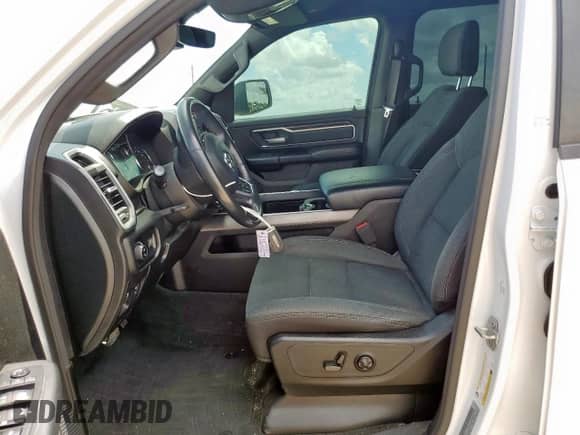 2020 Ram 1500 Lone Star with VIN 1C6RREFM0LN245982, listed as a Copart auction lot 61289665 with 97,036 mi miles and Salvage title. Bid and sale history available at DreamBid. Image 7.