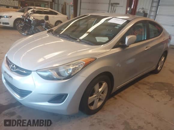 2011 Hyundai Elantra GLS z VIN KMHDH4AE5BU143075, wystawiony jako IAAI lot #42854793 z przebiegiem 125 307 mil mil oraz . Historia ofert i sprzedaży dostępna na DreamBid. Obrazek 2.