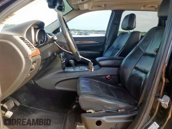 2012 Jeep Grand Cherokee Limited z VIN 1C4RJEBG5CC275197, wystawiony jako Copart lot #63839845 z przebiegiem 158 232 mil mil oraz Szkoda całkowita • Salvage title. Historia ofert i sprzedaży dostępna na DreamBid. Obrazek 7.