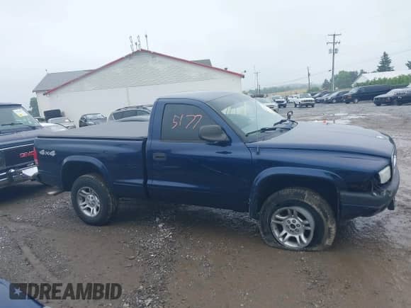 2004 Dodge Dakota with VIN 1D7GG36KX4S596268, listed as a IAAI auction lot 42535177 with 60,497 mi miles and . Bid and sale history available at DreamBid. Image 13.