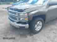2015 Chevrolet Silverado 1500 LT with VIN 1GCRCREC8FZ306552, listed as a IAAI auction lot 42826732 with 115,741 mi miles and . Bid and sale history available at DreamBid. Image 6.