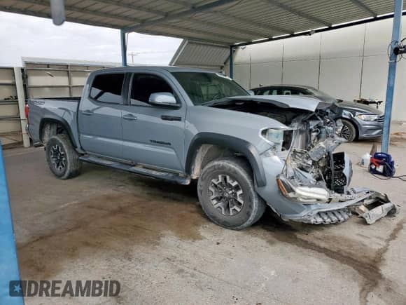 2019 Toyota Tacoma SR with VIN 3TMCZ5ANXKM271710, listed as a Copart auction lot 80954785 with 113,567 mi miles and Salvage title. Bid and sale history available at DreamBid. Image 4.