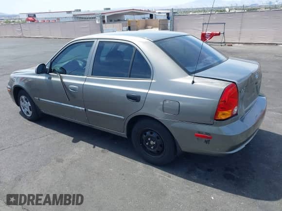 2003 Hyundai Accent GL с VIN KMHCG45C73U471607, выставлен на аукционе IAAI как лот 41956551 с пробегом 222 305 миль миль и . История ставок и продаж доступна на DreamBid. Изображение 3.