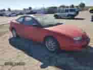 1999 Saturn SC с VIN 1G8ZY127XXZ314531, выставлен на аукционе Copart как лот 49653805 с пробегом 130 457 миль миль и Списание • Salvage title. История ставок и продаж доступна на DreamBid. Изображение 4.