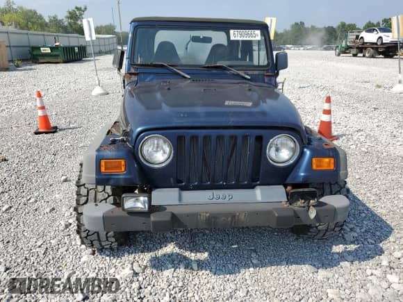 2000 Jeep Wrangler Sport with VIN 1J4FA49S5YP744967, listed as a Copart auction lot 67909665 with 141,990 mi miles and Clean title. Bid and sale history available at DreamBid. Image 5.