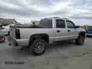 2005 GMC Sierra 1500 SLE z VIN 2GTEK13T151150626, wystawiony jako Copart lot #84979765 z przebiegiem 148 078 mil mil oraz Czysty tytuł • Clean title. Historia ofert i sprzedaży dostępna na DreamBid. Obrazek 3.