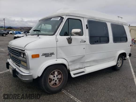 1994 Chevrolet Chevy Van with VIN 1GBEG25K0RF155749, listed as a Copart auction lot 43805835 with 136,959 mi miles and Salvage title. Bid and sale history available at DreamBid. Image 1.