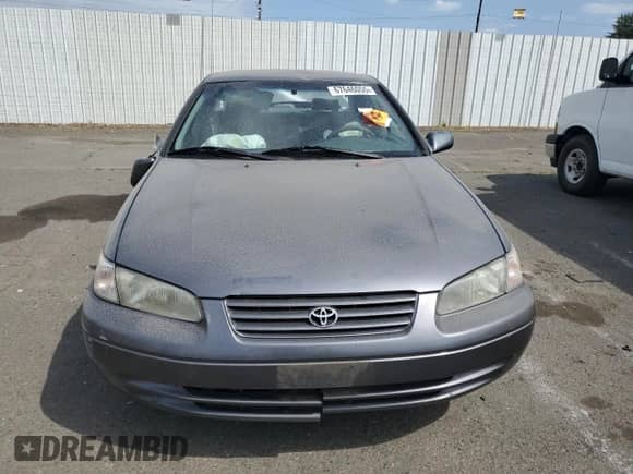 1997 Toyota Camry LE с VIN JT2BG22K3V0069893, выставлен на аукционе Copart как лот 67646055 с пробегом Не указан миль и Списание • Salvage title. История ставок и продаж доступна на DreamBid. Изображение 5.