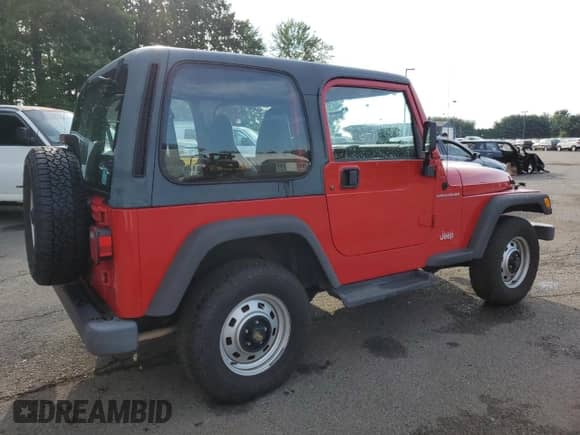 2000 Jeep Wrangler SE with VIN 1J4FA29P8YP711686, listed as a Copart auction lot 68999455 with 100,108 mi miles and Salvage title. Bid and sale history available at DreamBid. Image 3.