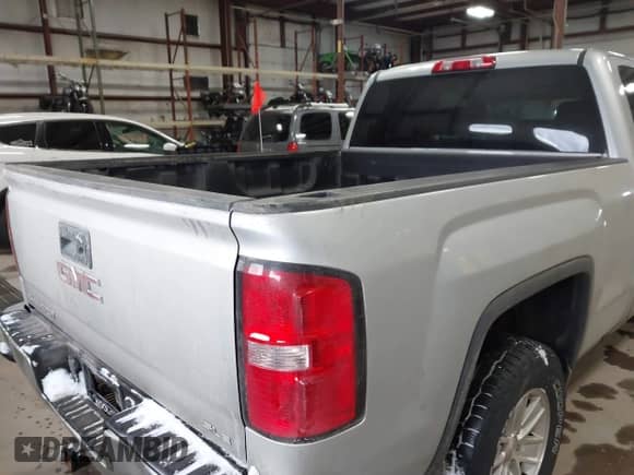 2016 GMC Sierra 1500 SLE with VIN 1GTV2MEH3GZ118961, listed as a IAAI auction lot 41585495 with 156,858 mi miles and . Bid and sale history available at DreamBid. Image 4.