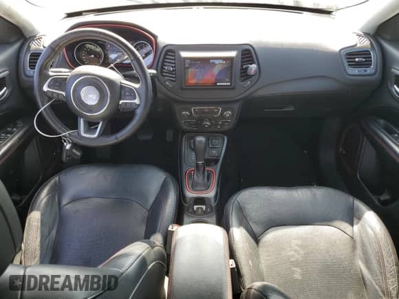 2017 Jeep Compass Trailhawk with VIN 3C4NJDDB1HT689762, listed as a Copart auction lot 60937205 with 99,282 mi miles and Salvage title. Bid and sale history available at DreamBid. Image 8.