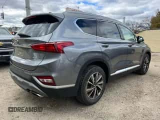 2019 Hyundai Santa Fe SEL with VIN 5NMS3CADXKH050958, listed as a Copart auction lot 90484835 with 153,434 mi miles and Clean title. Bid and sale history available at DreamBid. Image 4.