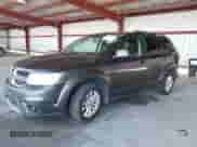 2015 Dodge Journey SXT with VIN 3C4PDCBG7FT595388, listed as a IAAI auction lot 43329453 with 205,122 mi miles and . Bid and sale history available at DreamBid. Image 2.