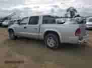 2002 Dodge Dakota Sport with VIN 1B7HL38N22S668501, listed as a Copart auction lot 50842275 with 224,264 mi miles and Salvage title. Bid and sale history available at DreamBid. Image 2.