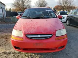 2005 Chevrolet Aveo LS z VIN KL1TD62695B489538, wystawiony jako Copart lot #82187044 z przebiegiem 84 361 mil mil oraz Czysty tytuł • Clean title. Historia ofert i sprzedaży dostępna na DreamBid. Obrazek 5.