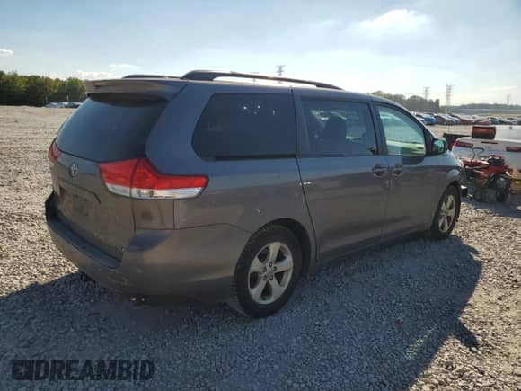 2011 Toyota Sienna LE with VIN 5TDKK3DC1BS141748, listed as a Copart auction lot 81907885 with 215,280 mi miles and Salvage title. Bid and sale history available at DreamBid. Image 3.