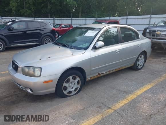 2003 Hyundai Elantra GLS with VIN KMHDN45D23U534986, listed as a IAAI auction lot 42723911 with 133,216 mi miles and . Bid and sale history available at DreamBid. Image 2.