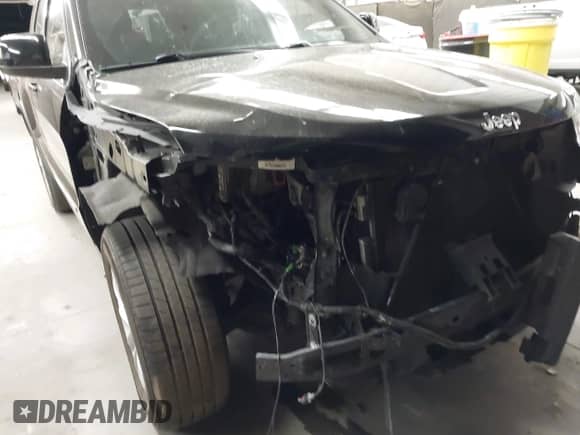 2021 Jeep Grand Cherokee Laredo E with VIN 1C4RJEAG7MC738928, listed as a IAAI auction lot 42708702 with 63,329 mi miles and . Bid and sale history available at DreamBid. Image 17.