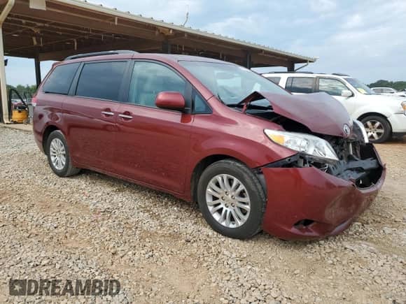 2011 Toyota Sienna XLE AAS with VIN 5TDYK3DC5BS050220, listed as a Copart auction lot 69008955 with 150,197 mi miles and Salvage title. Bid and sale history available at DreamBid. Image 4.