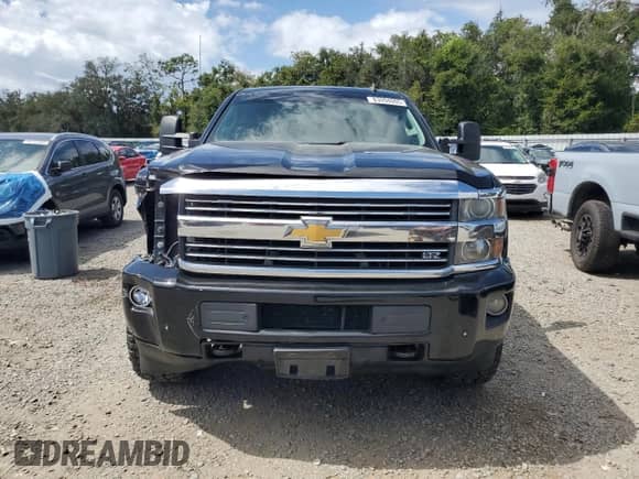 2015 Chevrolet Silverado 2500HD LTZ с VIN 1GC1KWE8XFF195563, выставлен на аукционе Copart как лот 83994095 с пробегом 196 008 миль миль и Списание • Salvage title. История ставок и продаж доступна на DreamBid. Изображение 5.