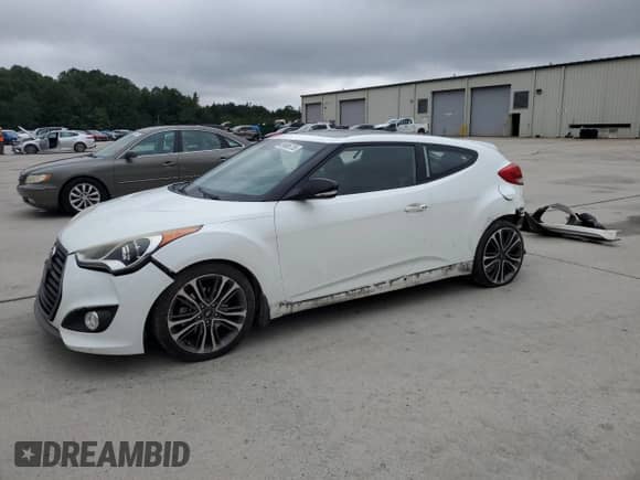 2016 Hyundai Veloster Turbo с VIN KMHTC6AE9GU293039, выставлен на аукционе Copart как лот 69986755 с пробегом 93 522 миль миль и Списание • Salvage title. История ставок и продаж доступна на DreamBid. Изображение 1.