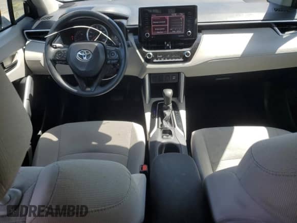 2022 Toyota Corolla Cross L with VIN 7MUAAAAG5NV004462, listed as a Copart auction lot 84825705 with 63,074 mi miles and Salvage title. Bid and sale history available at DreamBid. Image 8.